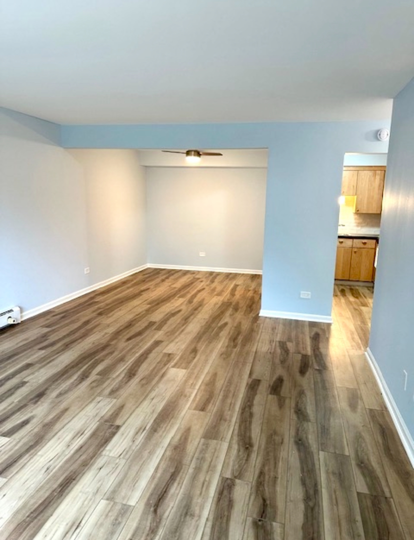 3515 Central Road, Unit 103 Glenview, IL 60025 - Photo 6 of 27 wooden floor in a room