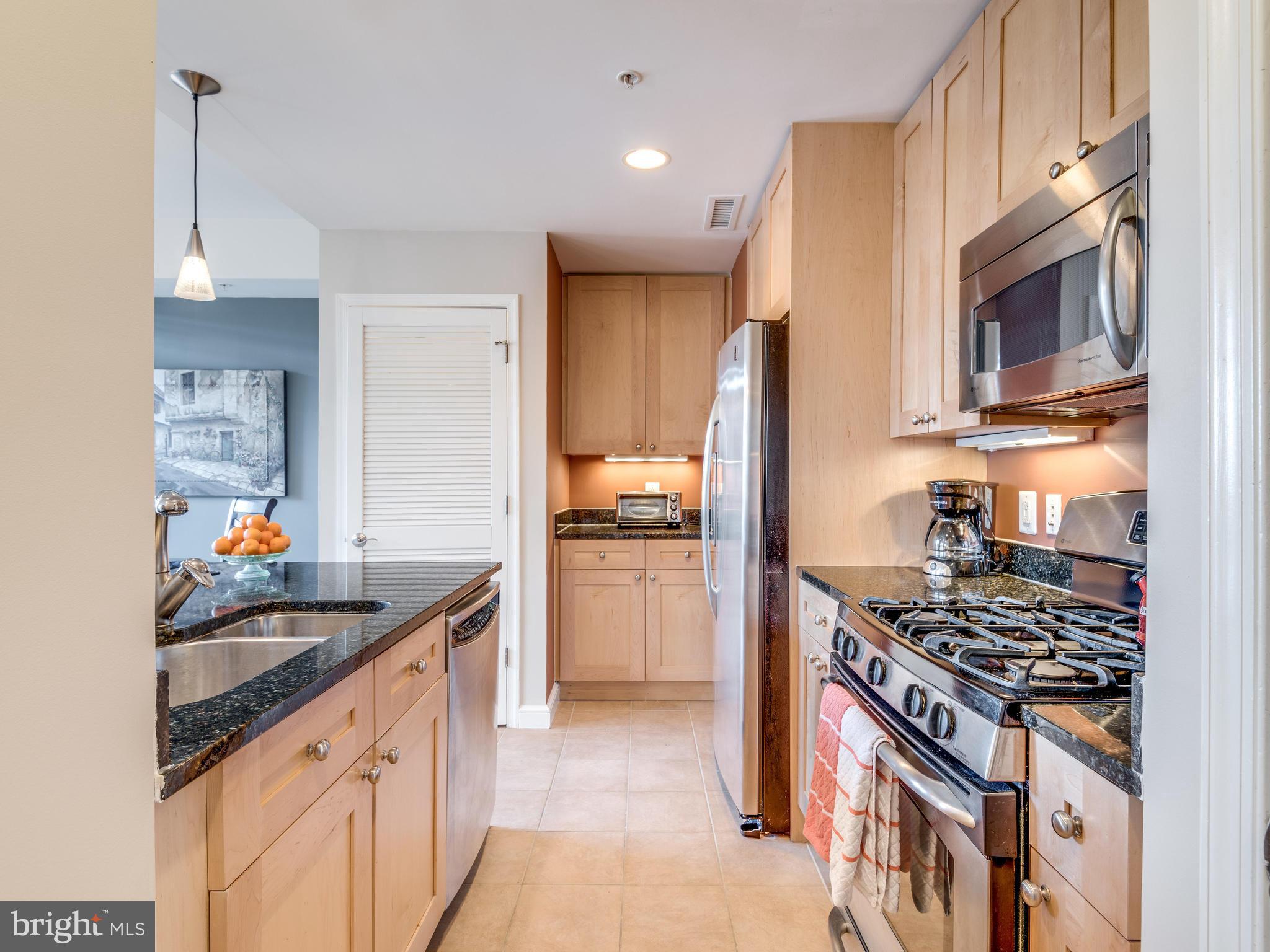 11990 Market Street, Unit 606 Reston, VA 20190 - Photo 12 of 30 Kitchen with Pantry