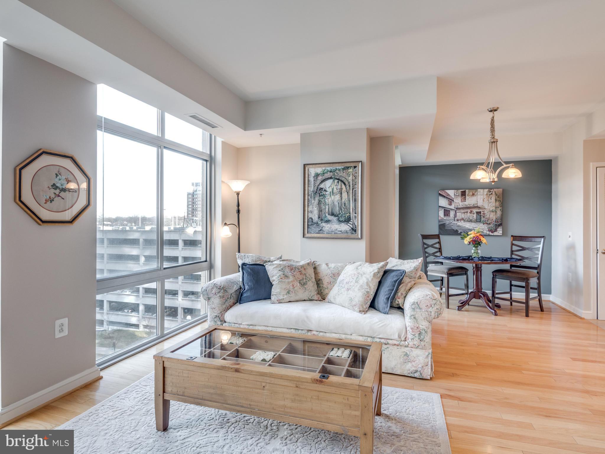 11990 Market Street, Unit 606 Reston, VA 20190 - Photo 3 of 30 Living Room with a Lot of Natural Light