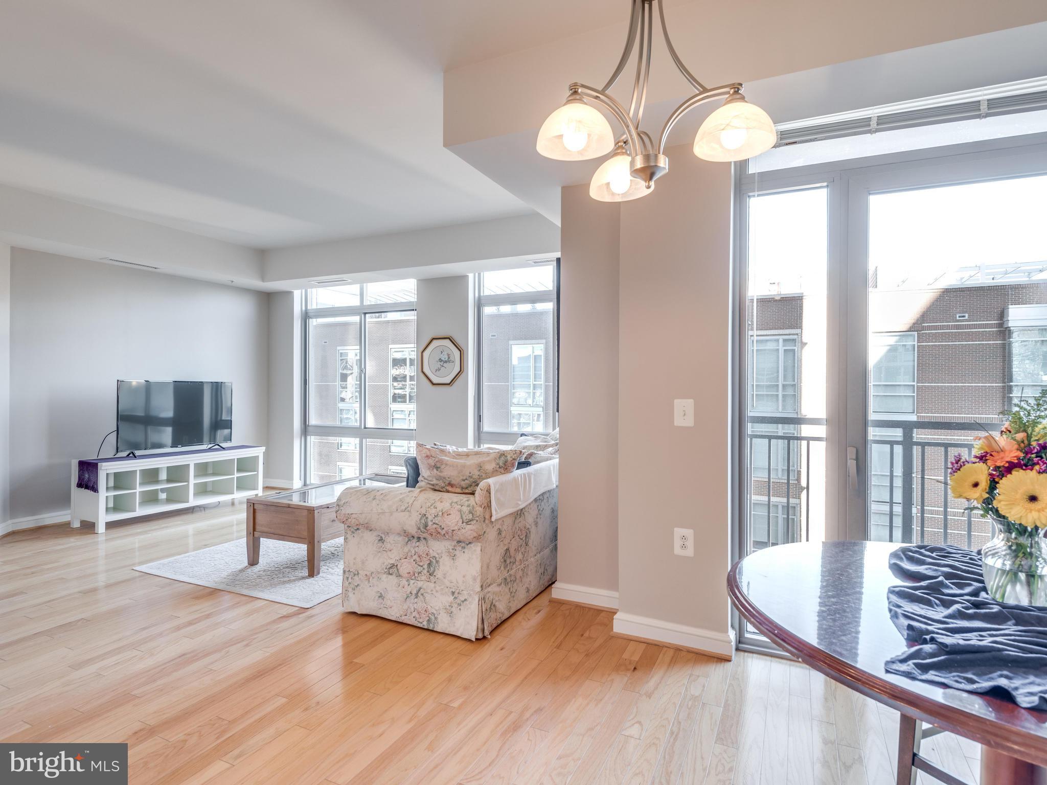 11990 Market Street, Unit 606 Reston, VA 20190 - Photo 5 of 30 Dining Room with Balcony