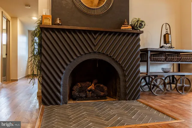 a large white kitchen with sink and cabinets