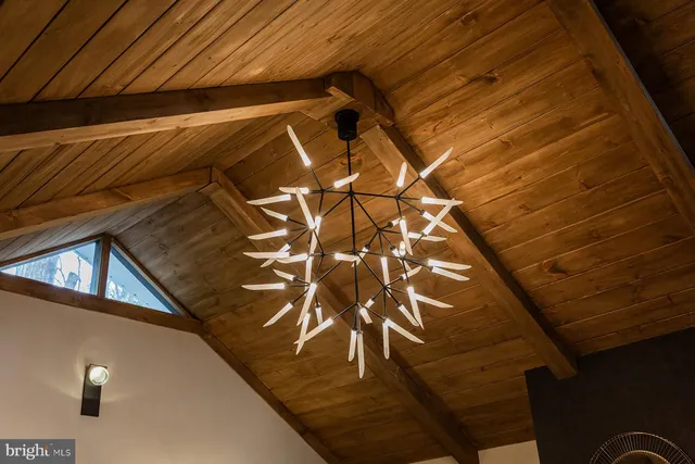 a view of a sink and cabinets in a room