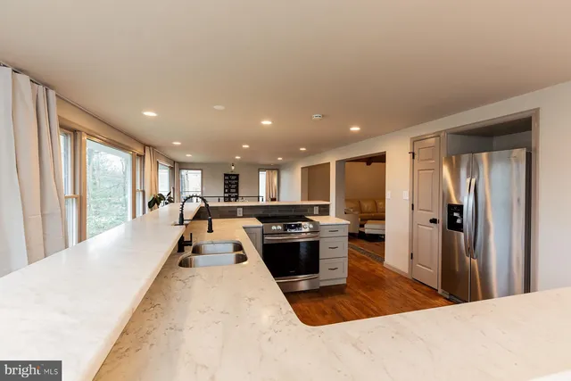 a bathroom with a toilet and shower