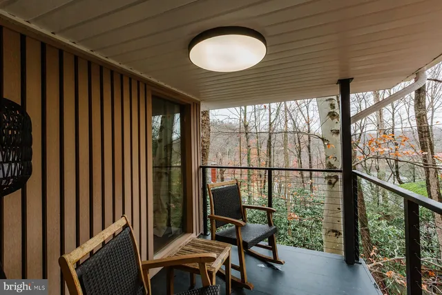 a bathroom with a sink mirror and a bathtub