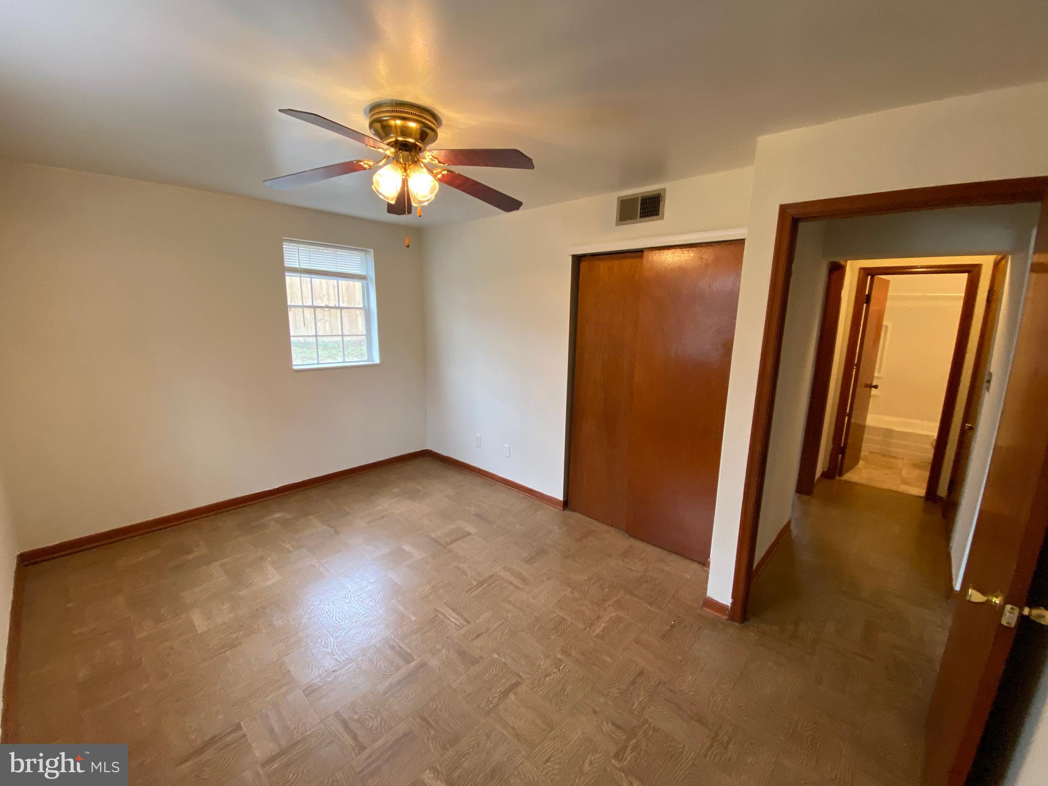 423 Hill Street, Unit 2 Culpeper, VA 22701 - Photo 11 of 18 a view of an empty room with a window