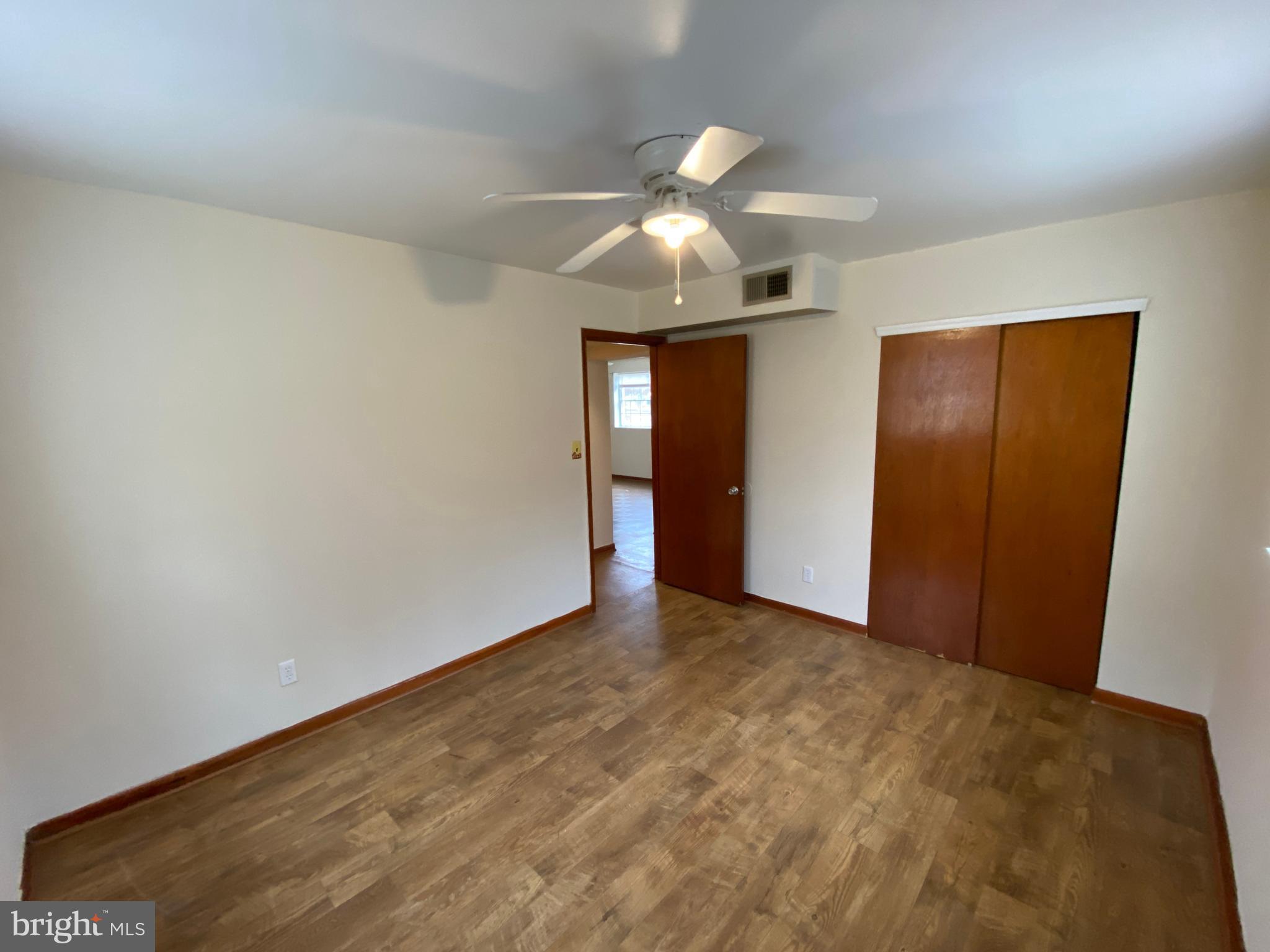 423 Hill Street, Unit 2 Culpeper, VA 22701 - Photo 14 of 18 wooden floor in an empty room