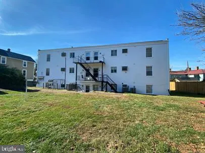 a house view with a backyard space
