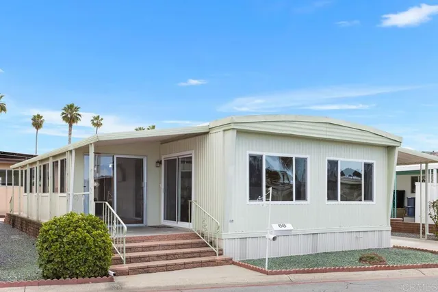 a front view of a house with a porch