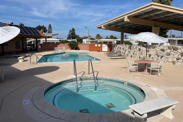 an aerial view of a house with outdoor space