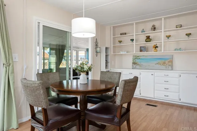 a view of a dining room with furniture