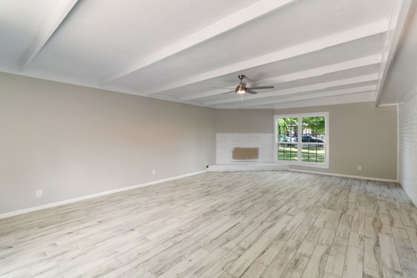 4104 Marsh Street Bryan, TX 77803 - Photo 11 of 26 wooden floor in an empty room with a window