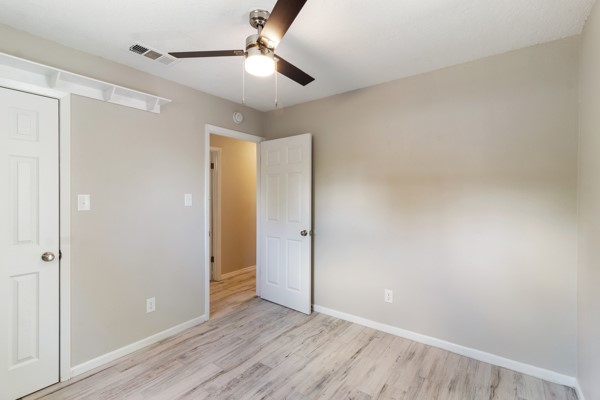 4104 Marsh Street Bryan, TX 77803 - Photo 20 of 26 a view of an empty room with wooden floor