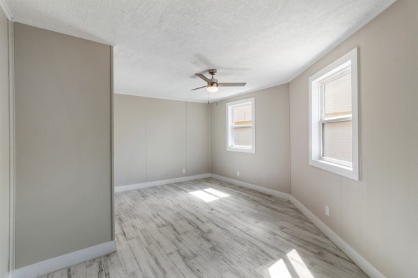 4104 Marsh Street Bryan, TX 77803 - Photo 23 of 26 wooden floor in an empty room with a window