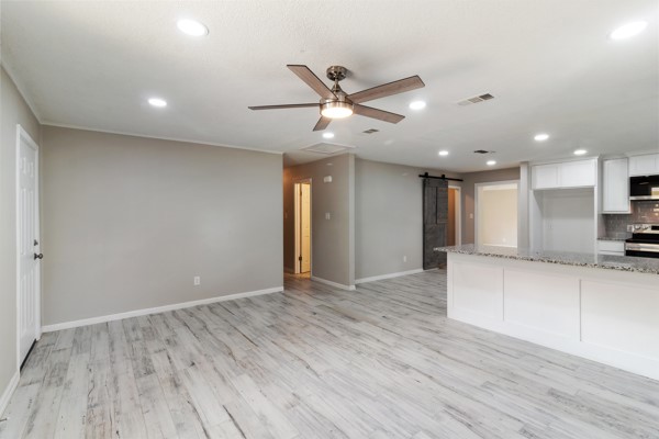 4104 Marsh Street Bryan, TX 77803 - Photo 5 of 26 a view of an empty room and kitchen view