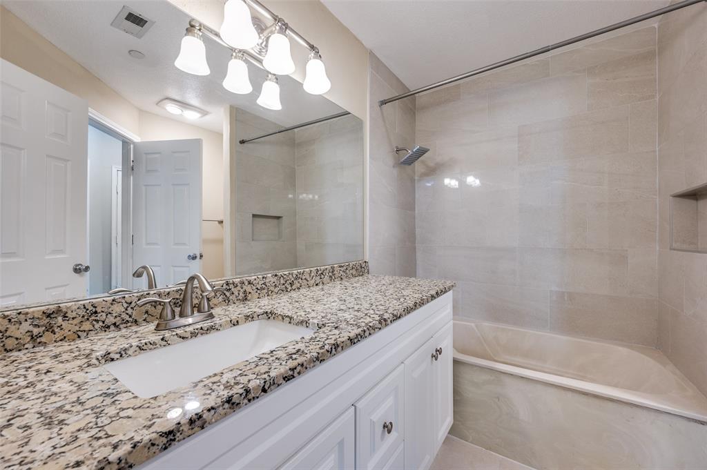 5565 Preston Oaks Road, Unit 130 Dallas, TX 75254 - Photo 16 of 25 Full bath with vanity and washtub / shower combination