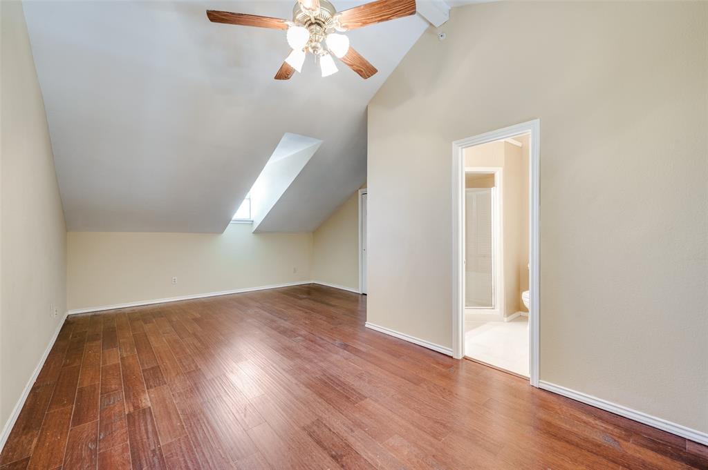 5565 Preston Oaks Road, Unit 130 Dallas, TX 75254 - Photo 19 of 25 Additional living space with light wood-style floors and ceiling fan