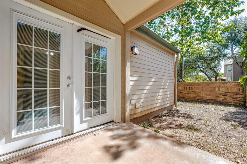 5565 Preston Oaks Road, Unit 130 Dallas, TX 75254 - Photo 22 of 25 Entrance to property featuring a patio
