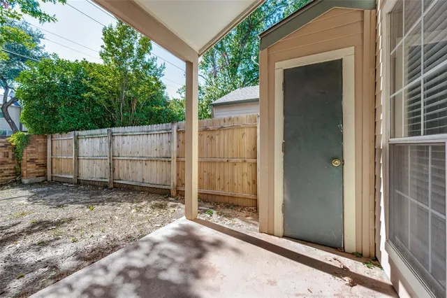 a view of backyard with green space