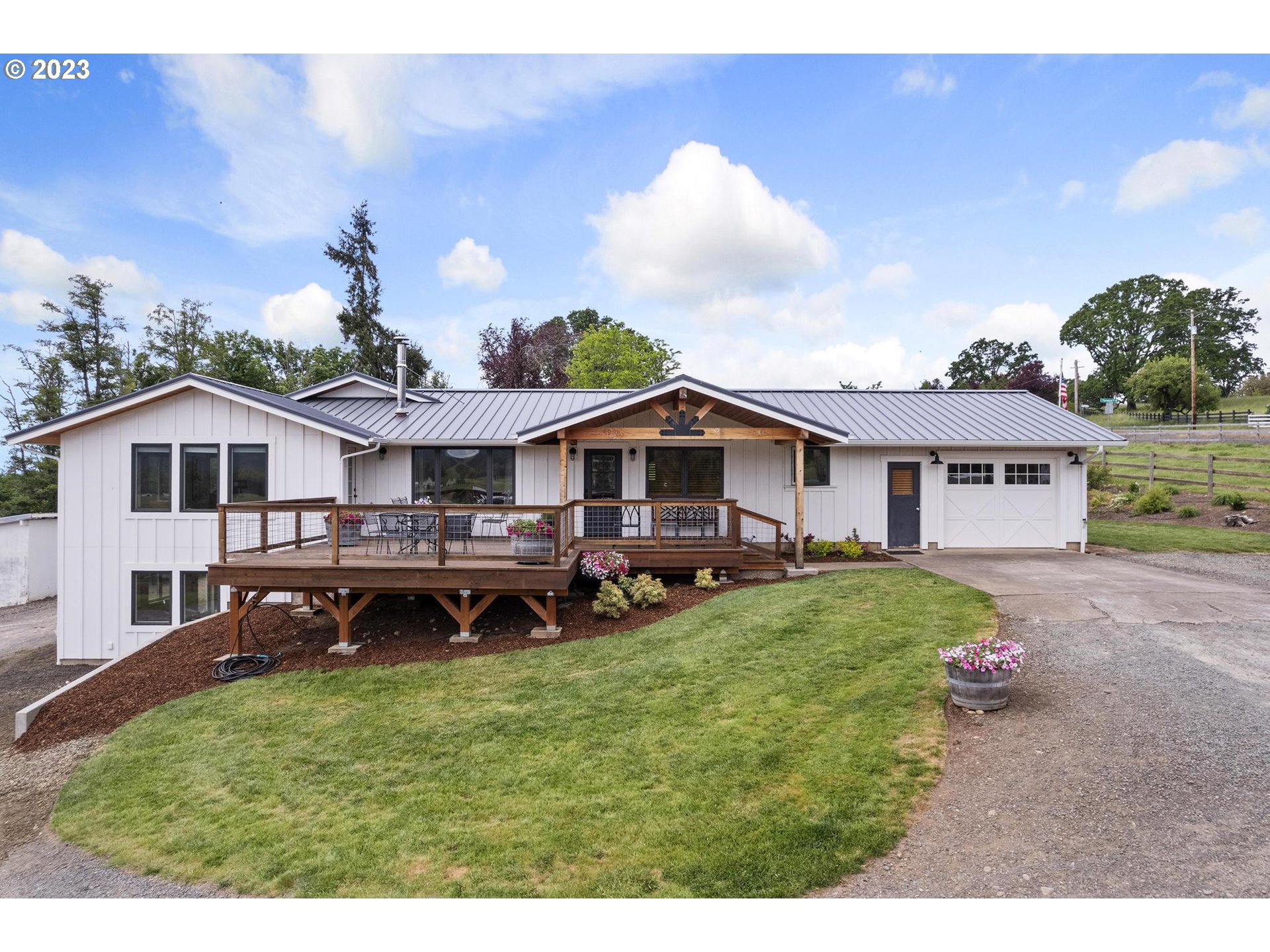 32877 South Wright Road Molalla, OR 97038 - Photo 2 of 34 a view of a house with a big yard and large trees