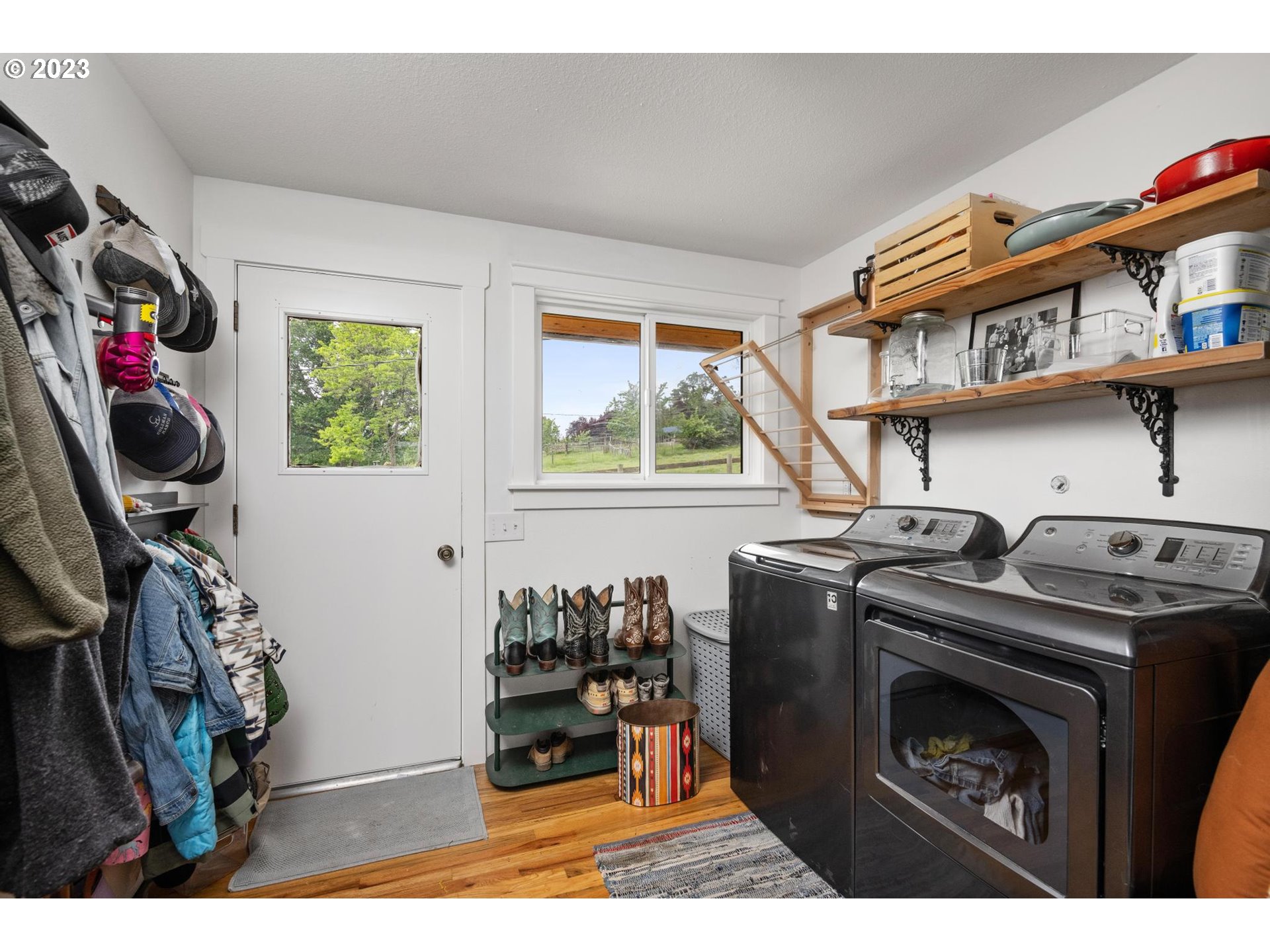 32877 South Wright Road Molalla, OR 97038 - Photo 23 of 34 a kitchen with stainless steel appliances granite countertop a stove and a sink