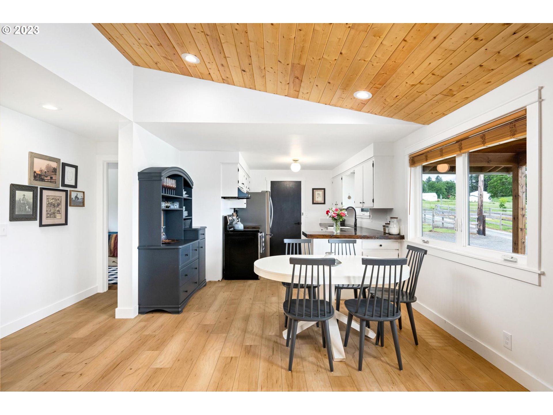 32877 South Wright Road Molalla, OR 97038 - Photo 10 of 34 a view of a dining room with furniture and a window