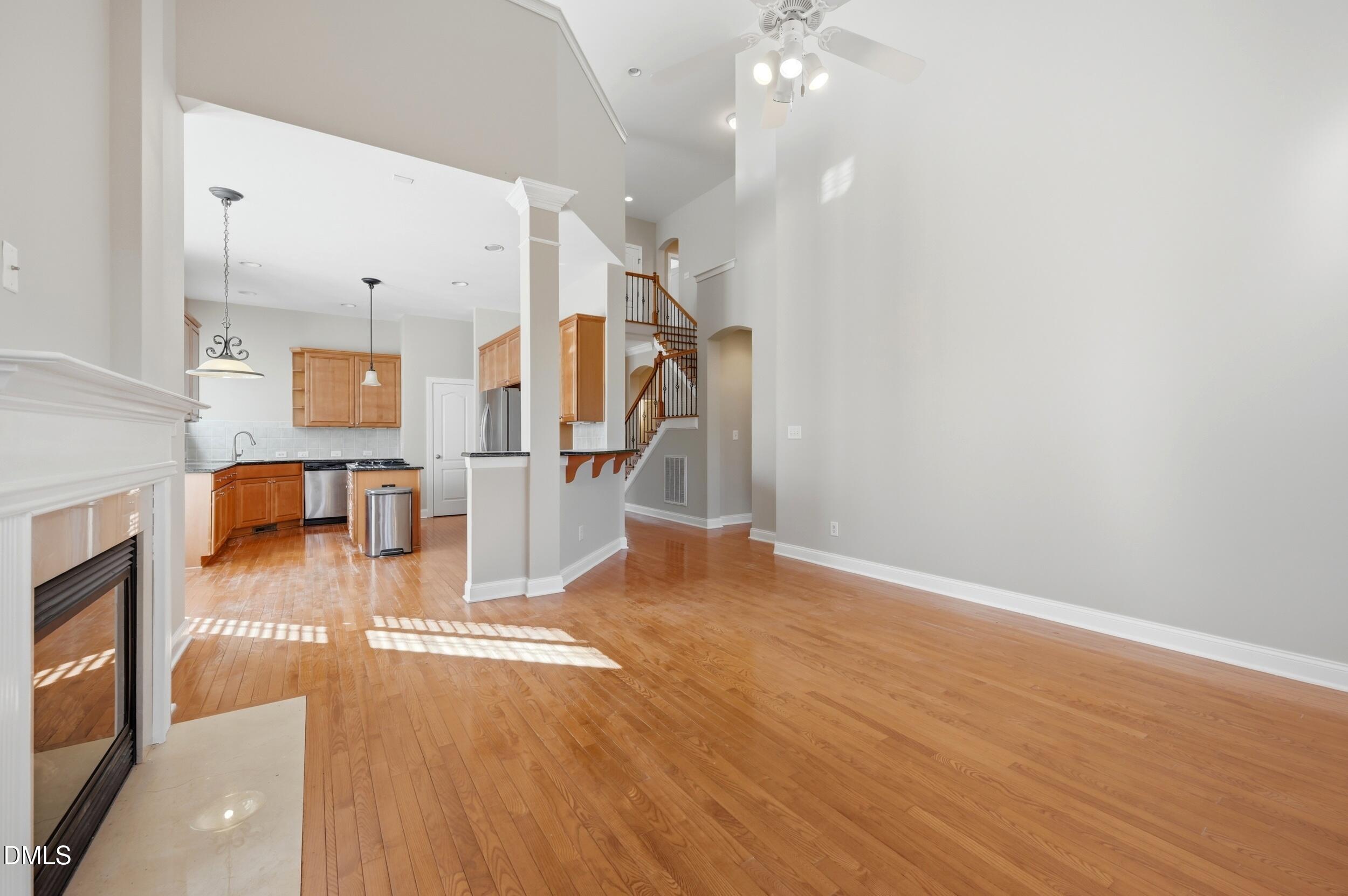 4803 Marena Place Durham, NC 27707 - Photo 12 of 42 a view of a room wooden floor and staircase