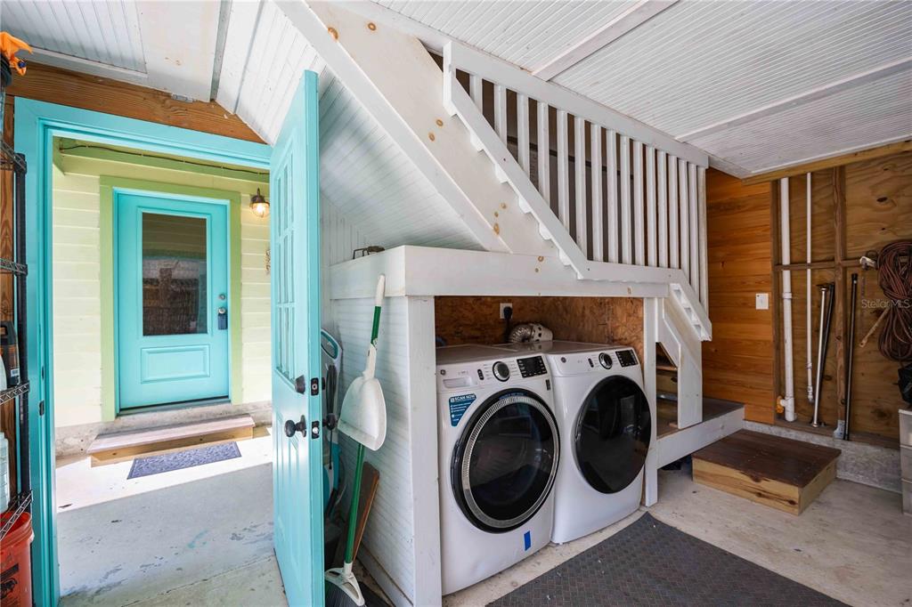 7348 Coach Road Port Charlotte, FL 33981 - Photo 30 of 48 a view of entryway with washer and dryer