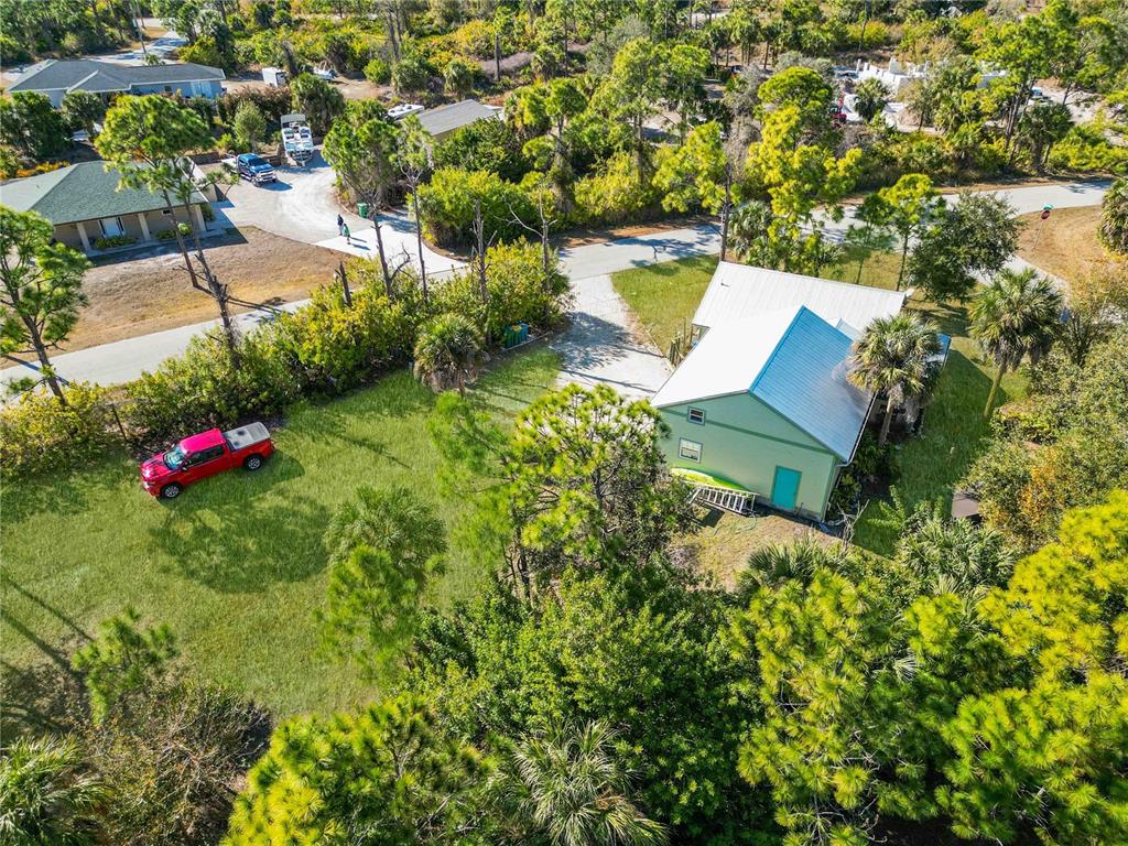 7348 Coach Road Port Charlotte, FL 33981 - Photo 43 of 48 an aerial view of a house with a yard