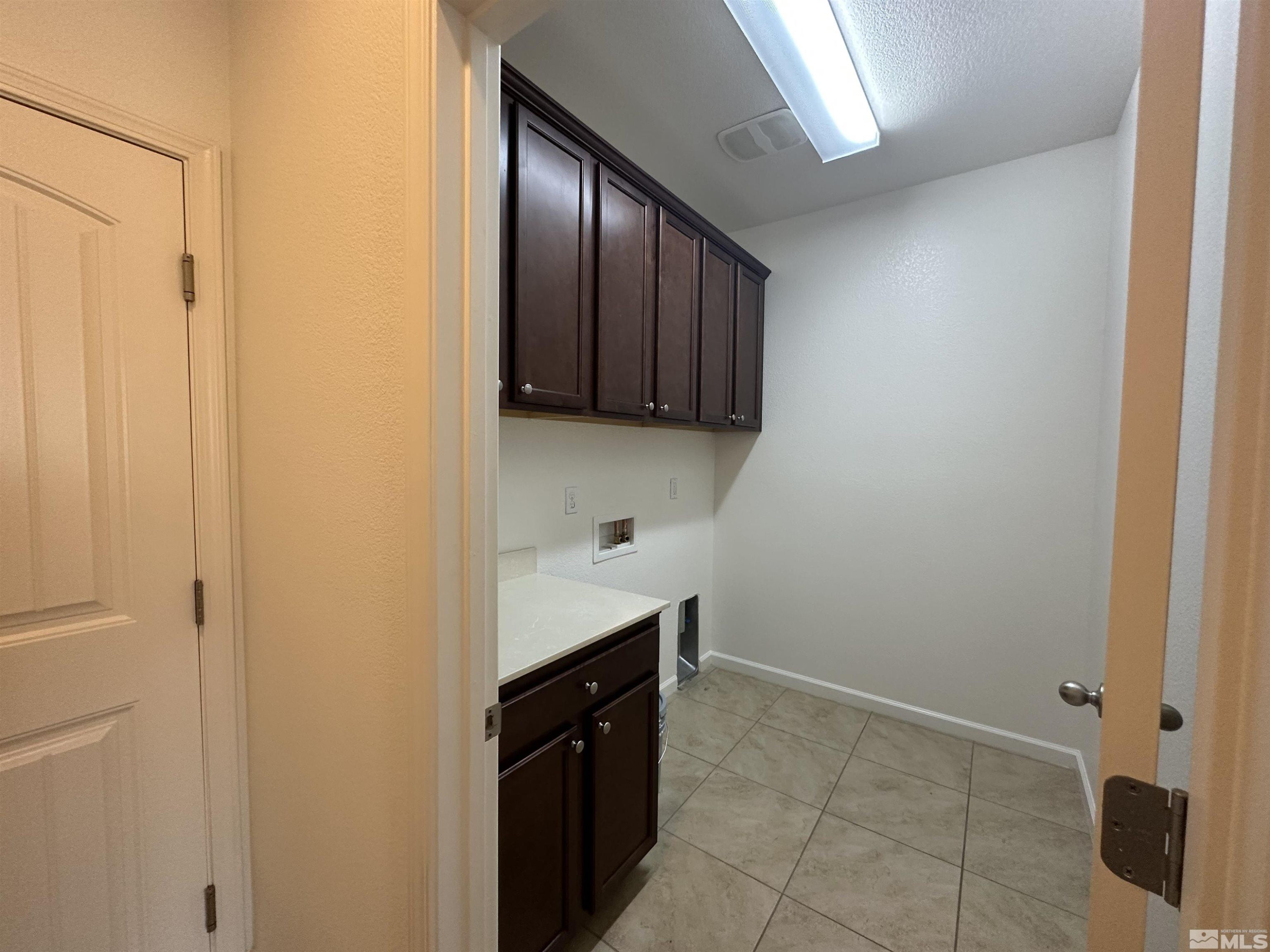 1960 Dutch Draft Drive Reno, NV 89521 - Photo 15 of 23 a kitchen with a sink and cabinets