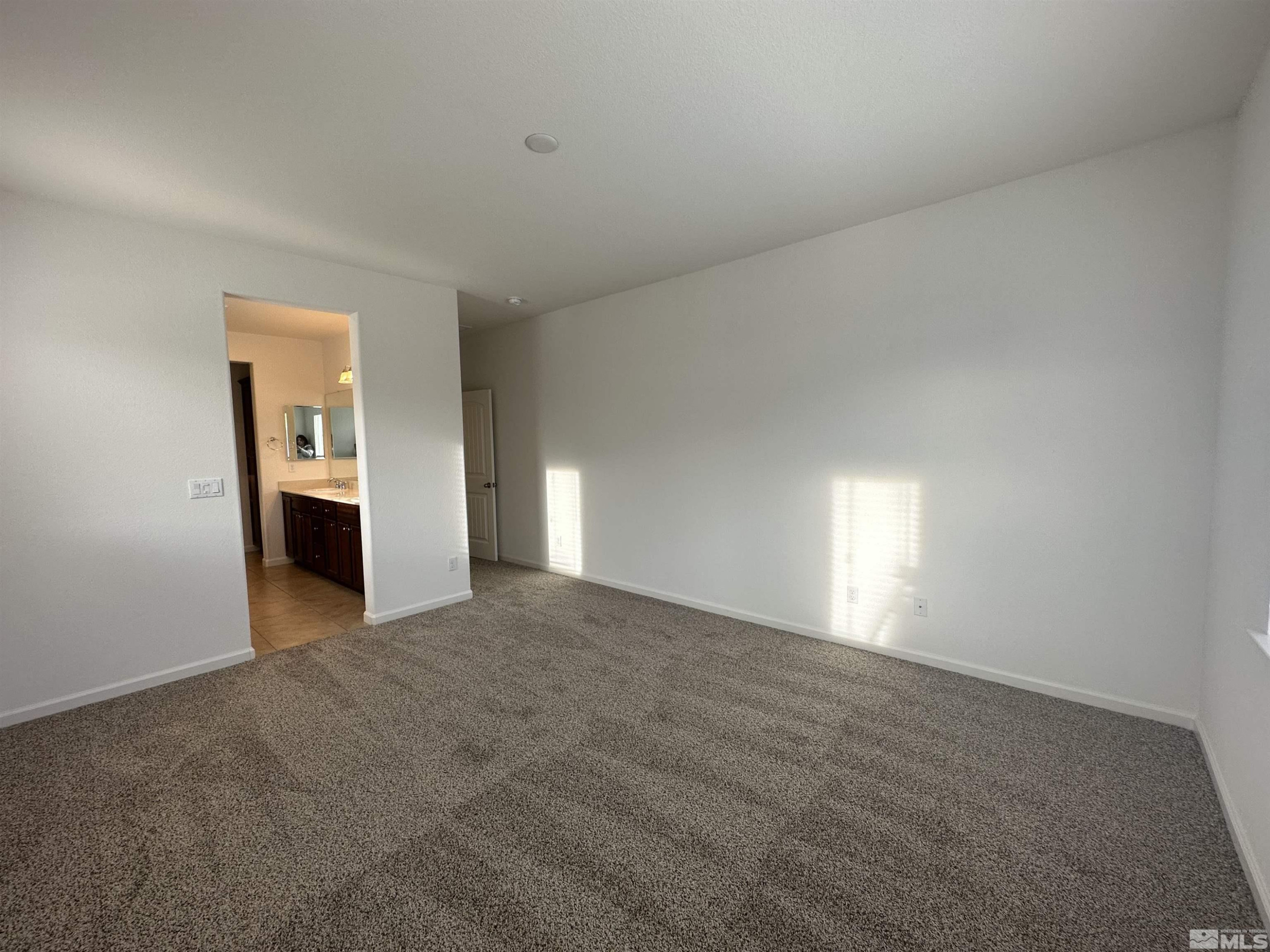 1960 Dutch Draft Drive Reno, NV 89521 - Photo 17 of 23 a view of empty room with a fireplace