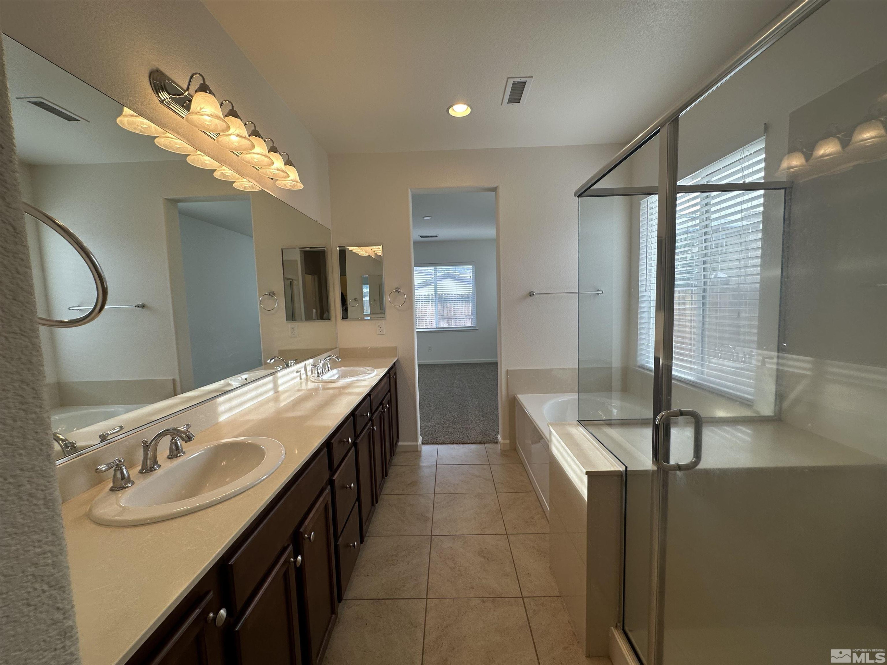 1960 Dutch Draft Drive Reno, NV 89521 - Photo 21 of 23 a kitchen with granite countertop a sink and a stove