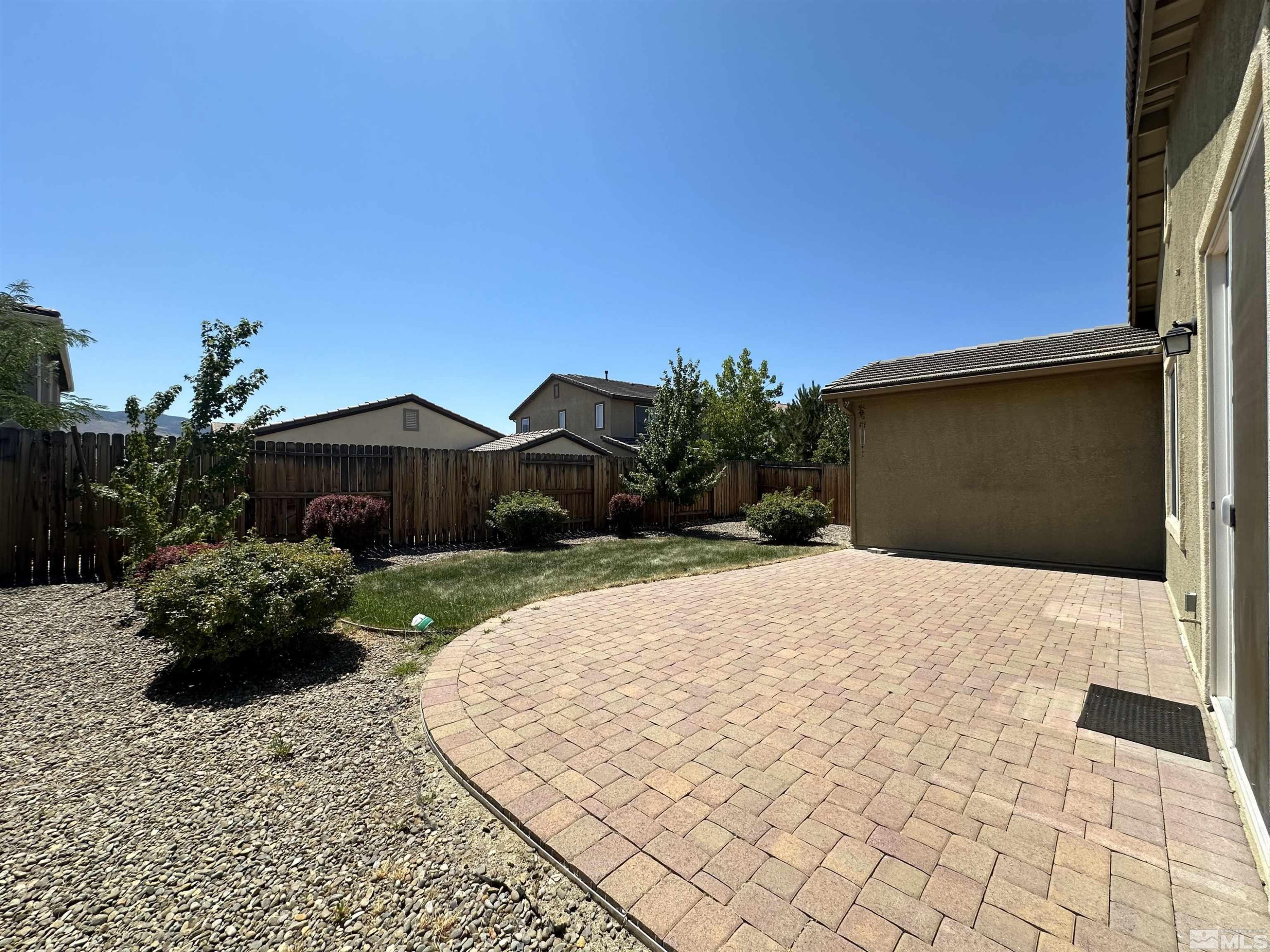 1960 Dutch Draft Drive Reno, NV 89521 - Photo 23 of 23 a front view of house with yard and trees