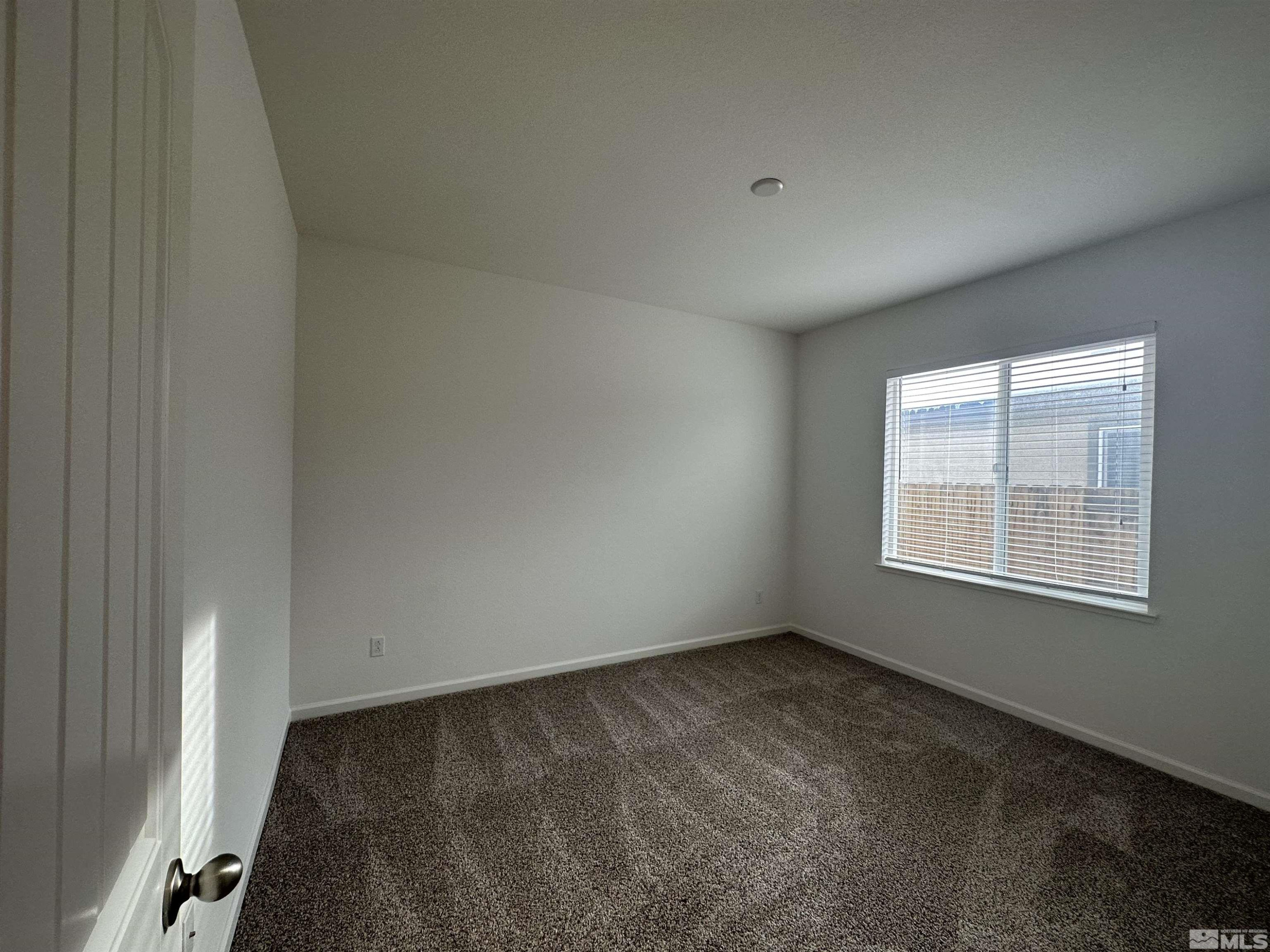 1960 Dutch Draft Drive Reno, NV 89521 - Photo 6 of 23 an empty room with a window