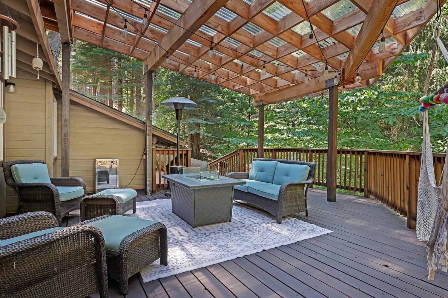 6224 Drop Off Road Pollock Pines, CA 95726 - Photo 23 of 46 a balcony with furniture and wooden floor