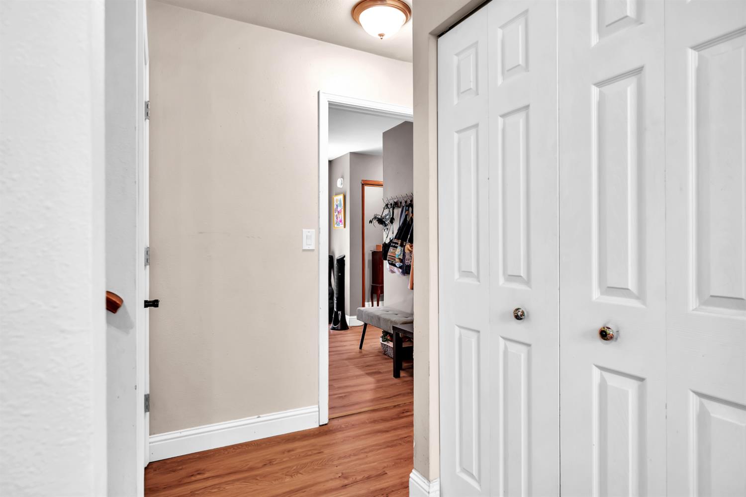 6224 Drop Off Road Pollock Pines, CA 95726 - Photo 41 of 46 a view of a hallway with wooden floor and staircase