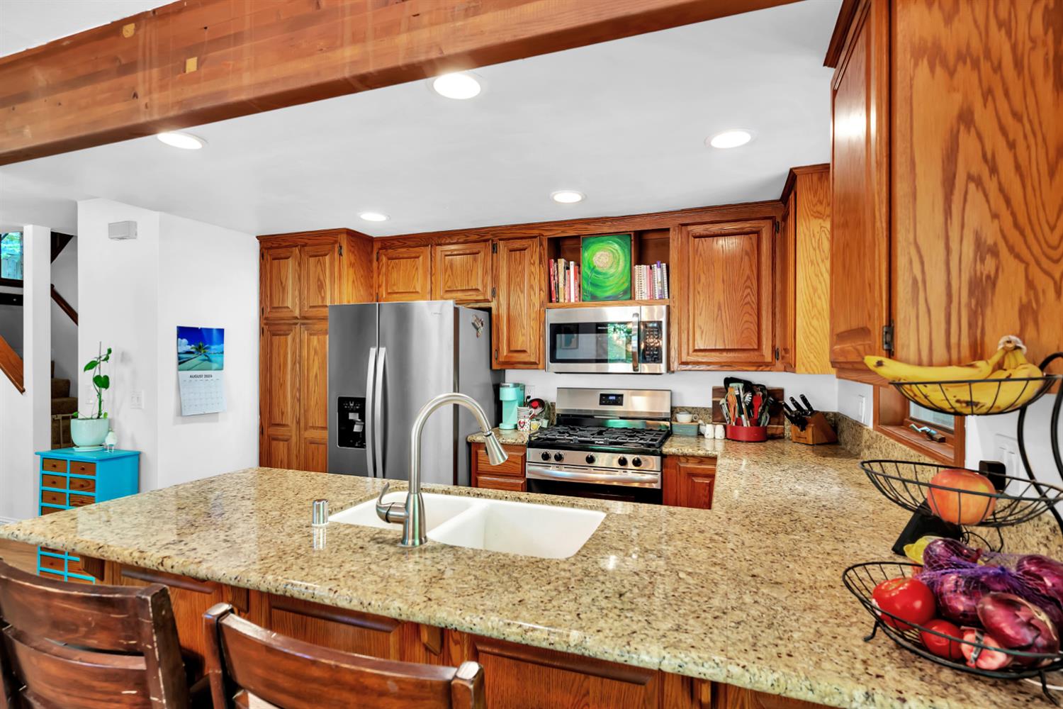 6224 Drop Off Road Pollock Pines, CA 95726 - Photo 5 of 46 a kitchen with stainless steel appliances granite countertop sink stove and refrigerator