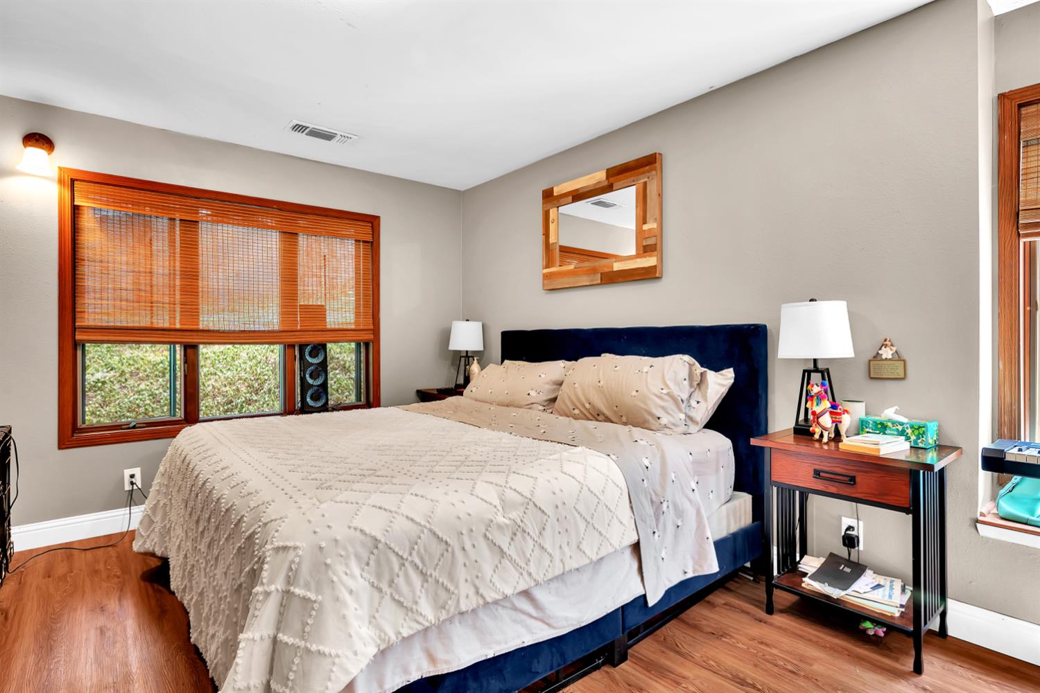 6224 Drop Off Road Pollock Pines, CA 95726 - Photo 9 of 46 a large bed sitting in a bedroom next to a window