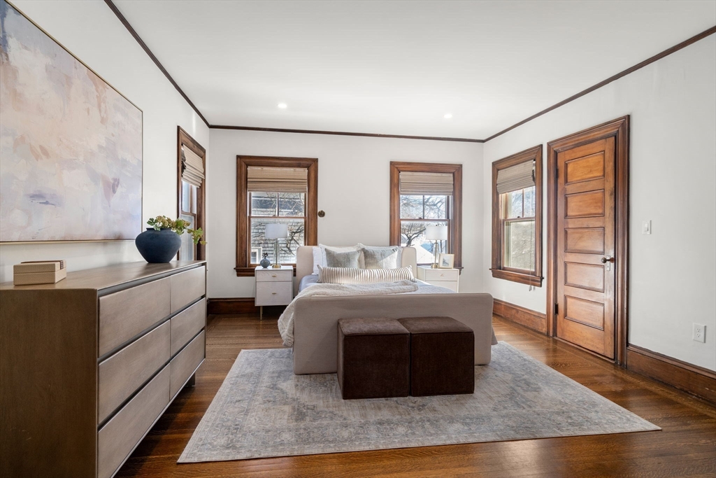 16 Prescott Street Newton, MA 02460 - Photo 14 of 29 a bed room with a bed and a couch