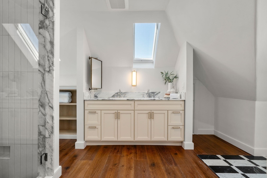 16 Prescott Street Newton, MA 02460 - Photo 18 of 29 a bathroom with a sink and a mirror