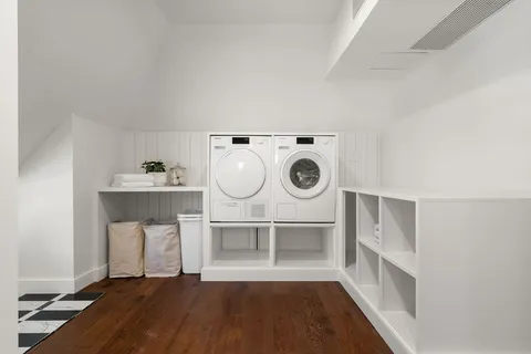 a view of a storage & utility room with washer and dryer