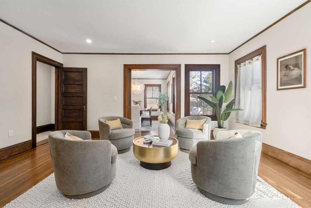 16 Prescott Street Newton, MA 02460 - Photo 8 of 29 a living room with furniture and a potted plant