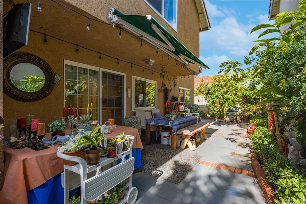 15 Calandria Irvine, CA 92620 - Photo 34 of 49 a view of a patio with table and chairs and potted plants