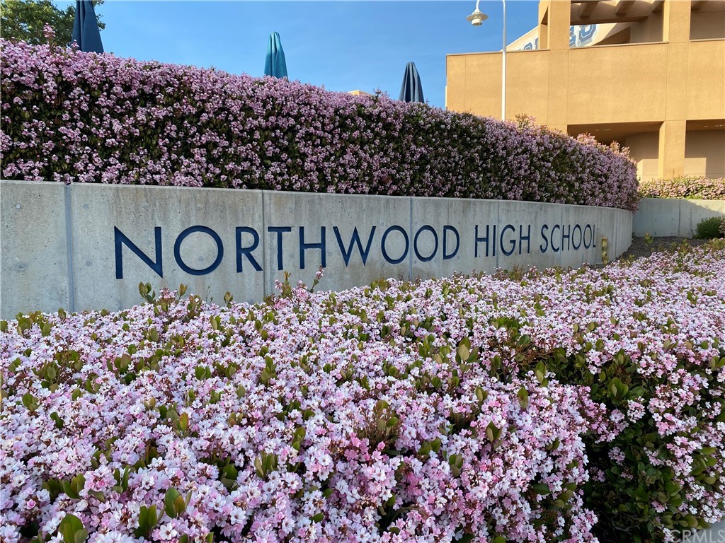 15 Calandria Irvine, CA 92620 - Photo 43 of 49 a sign that is next to a building