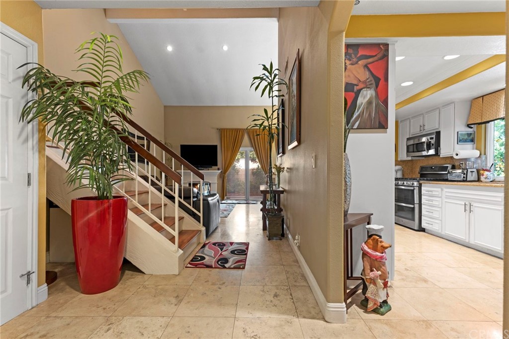 15 Calandria Irvine, CA 92620 - Photo 10 of 49 a view of a hallway with entryway closet and living room view