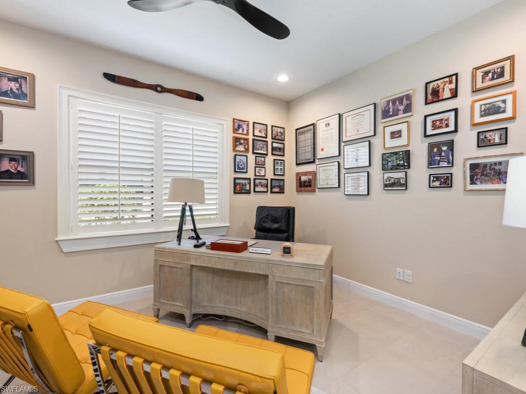 12766 Dundee Lane Naples, FL 34120 - Photo 23 of 37 a bedroom with furniture and a window