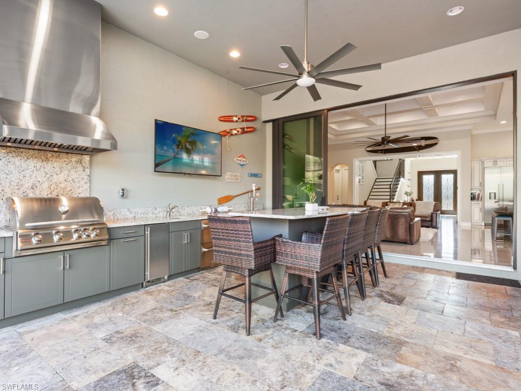 12766 Dundee Lane Naples, FL 34120 - Photo 27 of 37 a view of a dining room with furniture