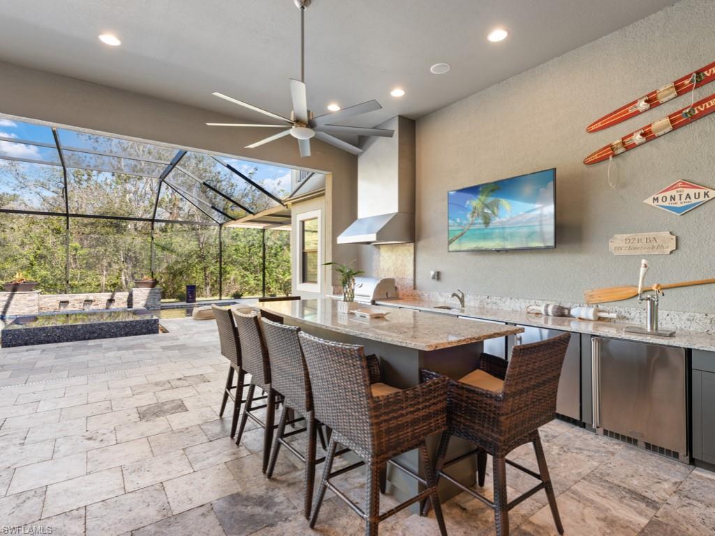 12766 Dundee Lane Naples, FL 34120 - Photo 28 of 37 a view of a dining area with furniture window and outside view