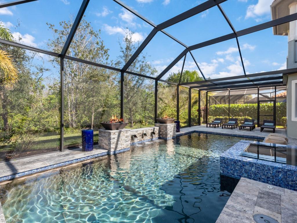 12766 Dundee Lane Naples, FL 34120 - Photo 32 of 37 a view of swimming pool with outdoor seating