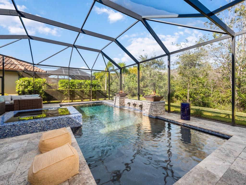 12766 Dundee Lane Naples, FL 34120 - Photo 35 of 37 a view of swimming pool with a patio