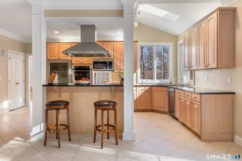 a view of living room with furniture and flat screen tv